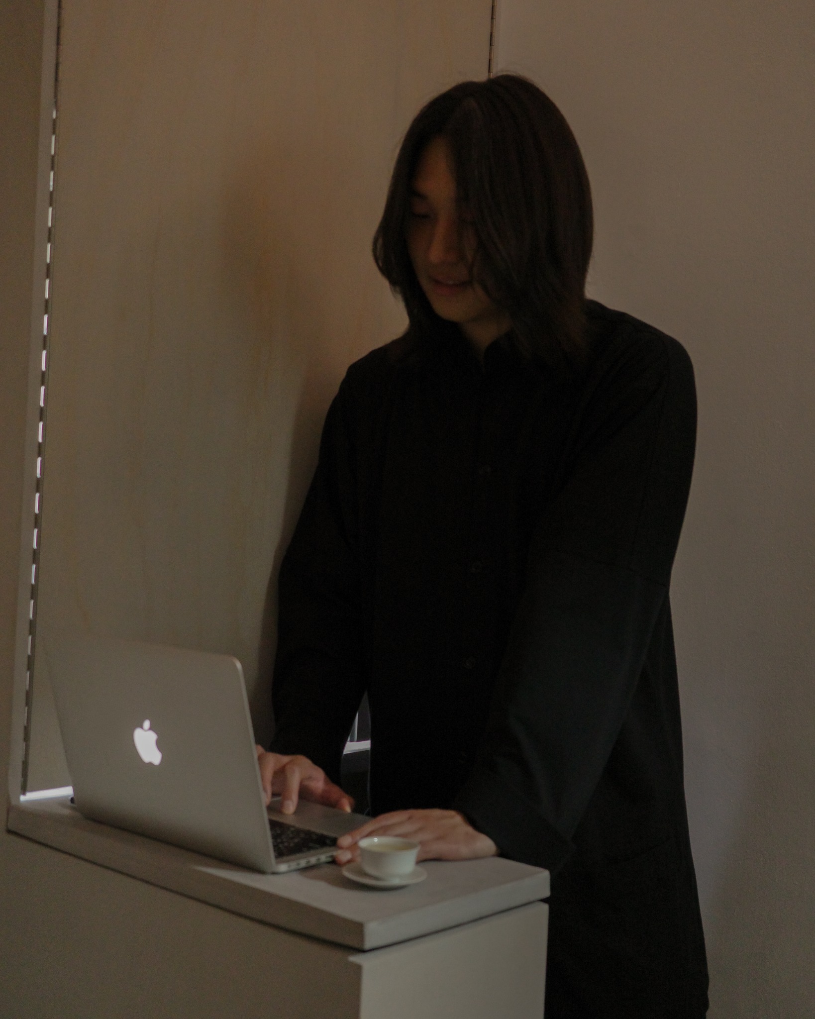 Jinwoo at the listening-session equipment during the exhibition